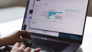 Hand typing on computer